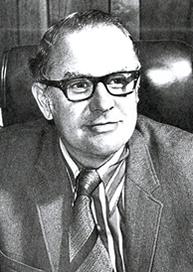 headshot of Dr. Cornelius Robbins